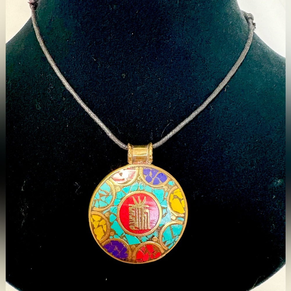 Tibetan om symbol pendent necklace